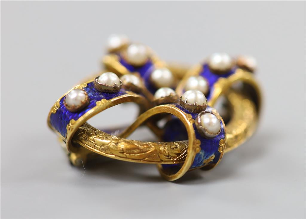 A Victorian yellow metal, blue enamel and split pearl set interwoven oval brooch, 35mm, gross 14 grams.
